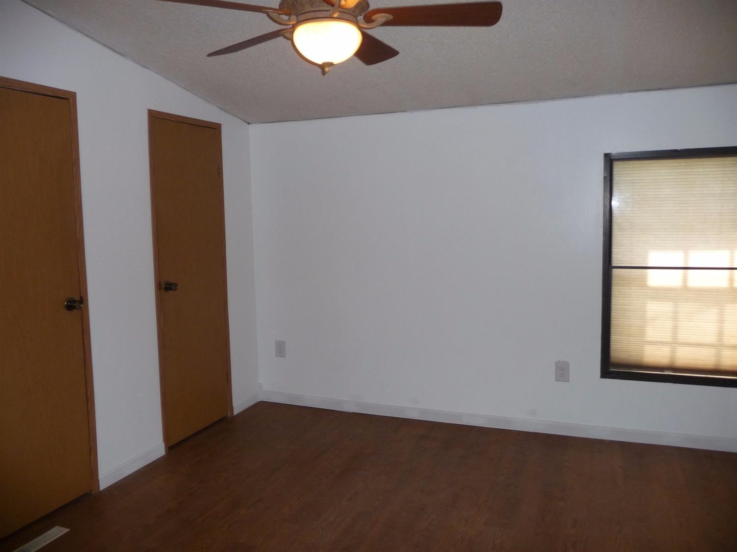 11889 Old Colony Road Demotte, IN 46310 - Photo 4 of 10 an empty room with windows