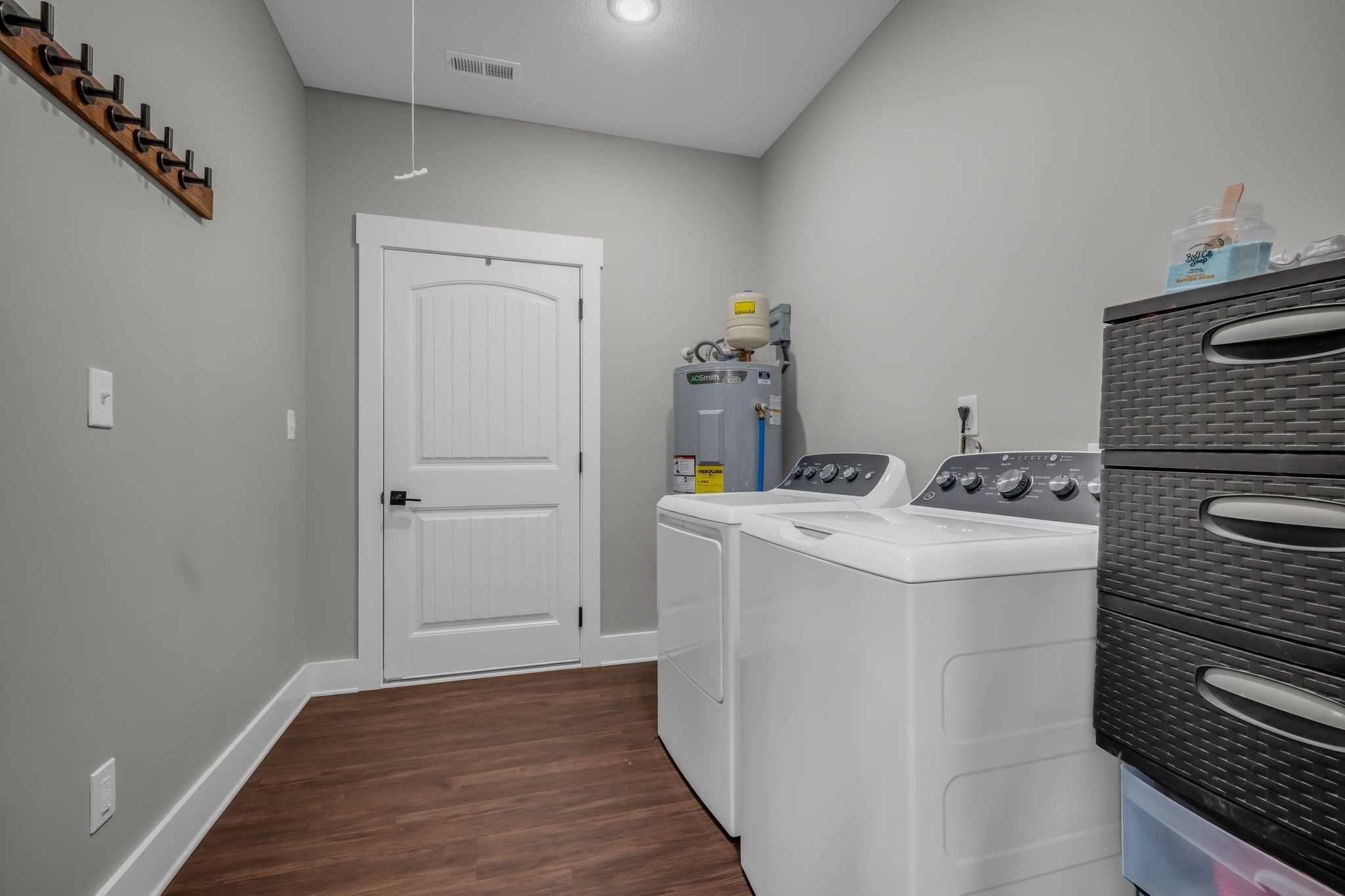 454 Gum Branch Road Burns, TN 37029 - Photo 18 of 27 a utility room with dryer and washer