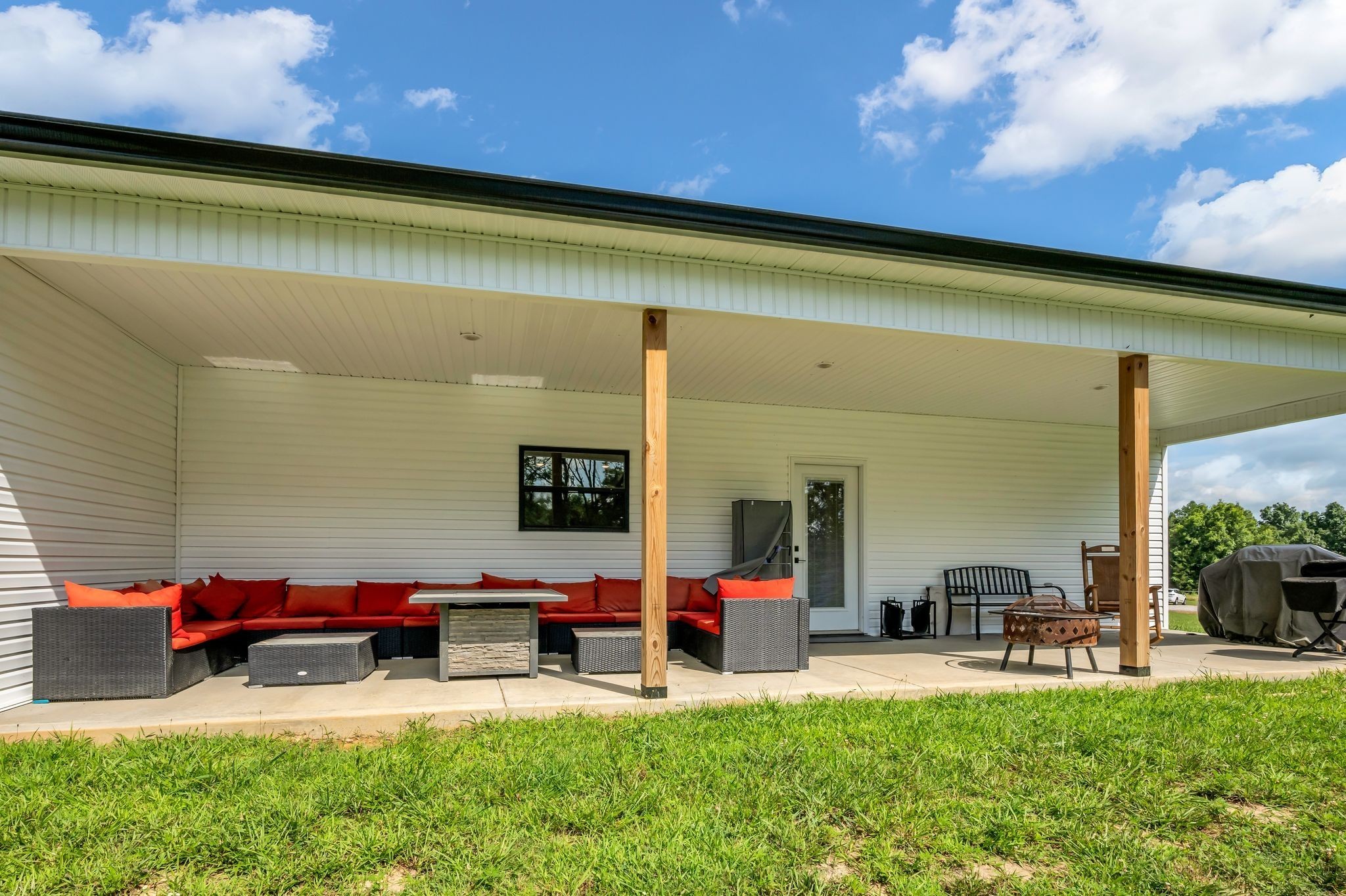454 Gum Branch Road Burns, TN 37029 - Photo 25 of 27 a living room with furniture and a flat screen tv