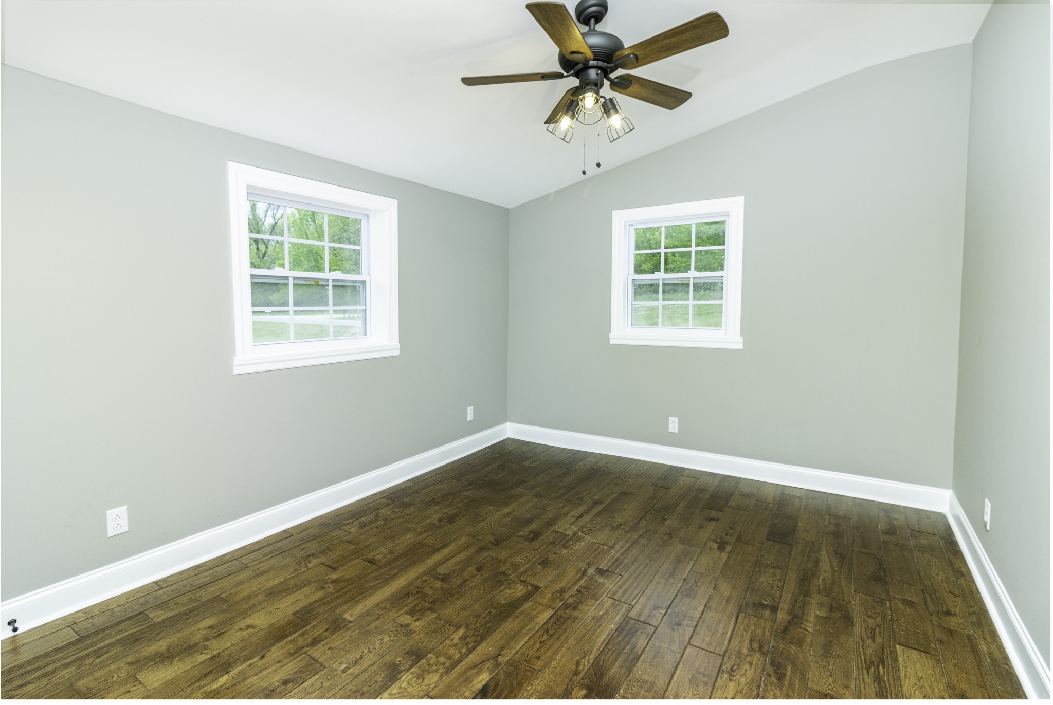 4768 Stella Road Prospect, TN 38477 - Photo 11 of 33 an empty room with wooden floor fan and windows