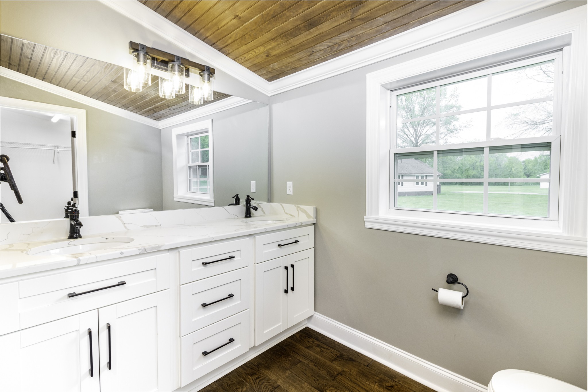 4768 Stella Road Prospect, TN 38477 - Photo 14 of 33 a bathroom with a granite countertop sink mirror and a large window