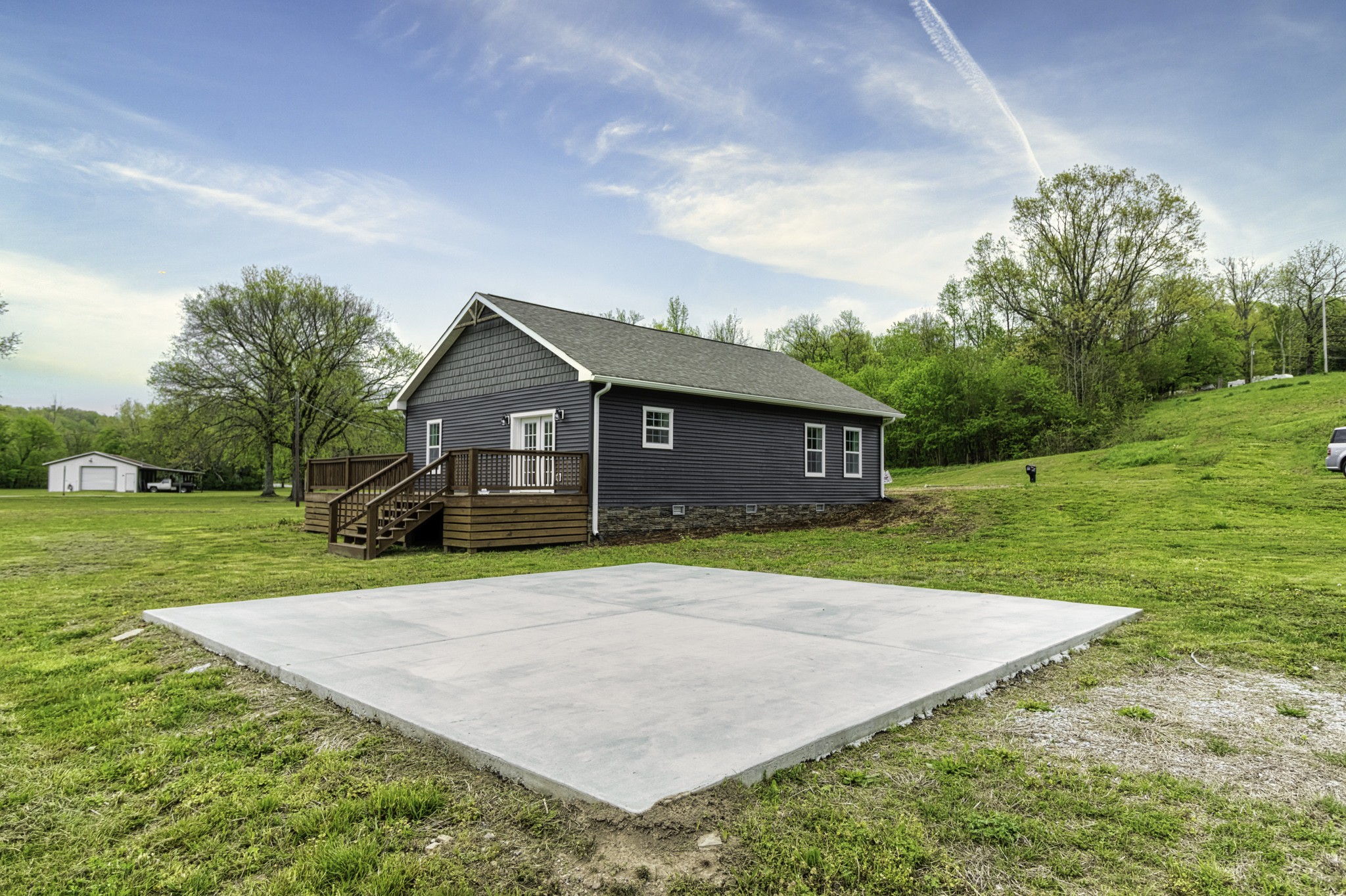 4768 Stella Road Prospect, TN 38477 - Photo 17 of 33 a front view of a house with a yard