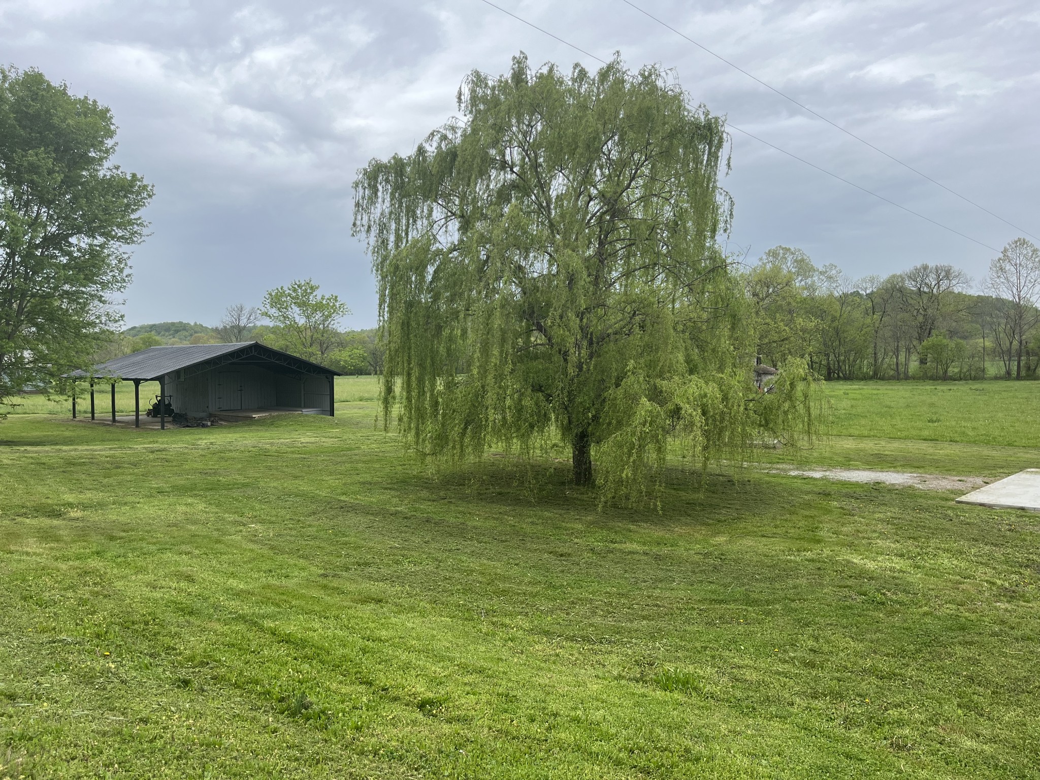 4768 Stella Road Prospect, TN 38477 - Photo 22 of 33 a large body of water with a building in the background