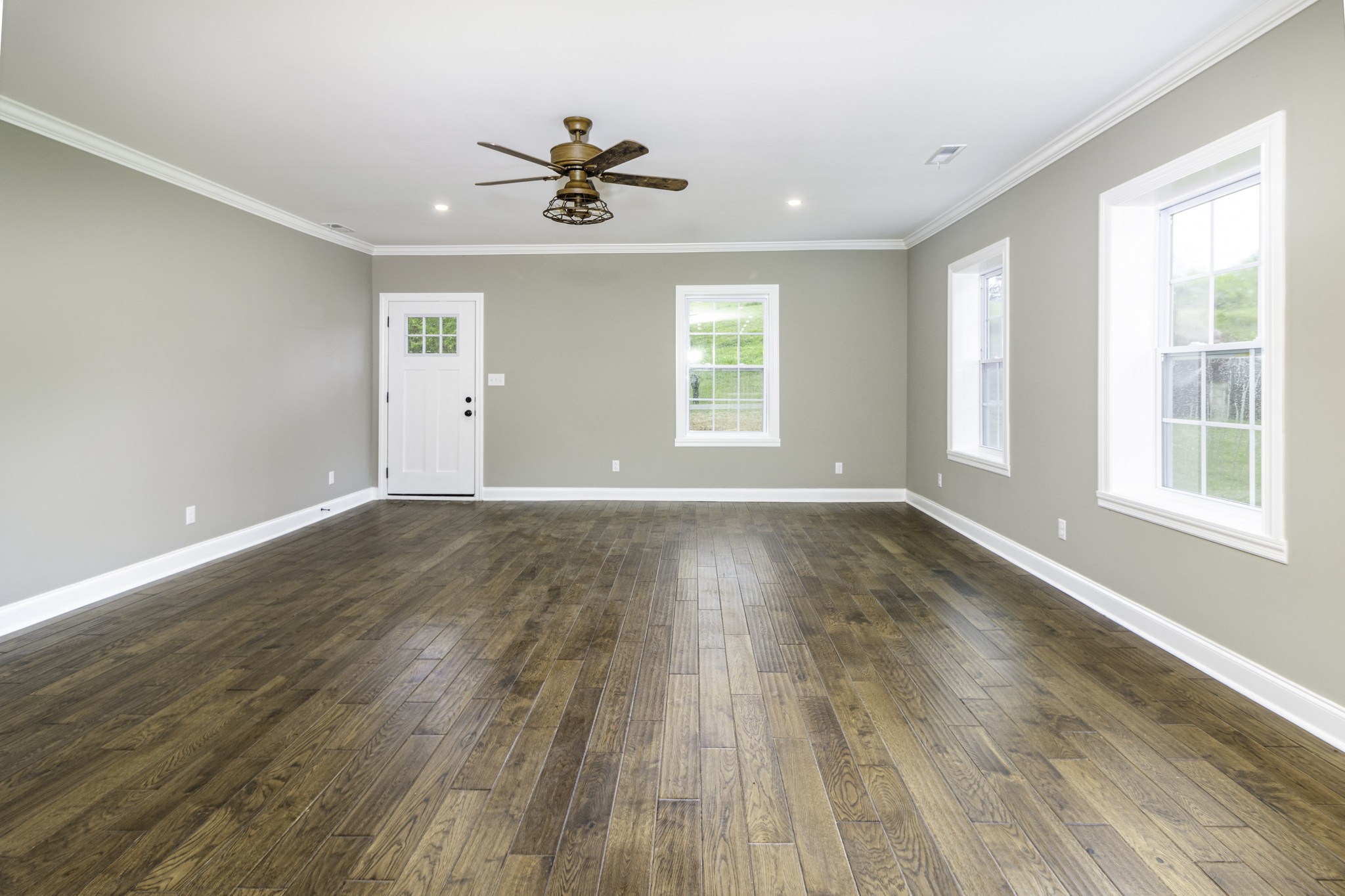 4768 Stella Road Prospect, TN 38477 - Photo 3 of 33 a view of an empty room with wooden floor and a window
