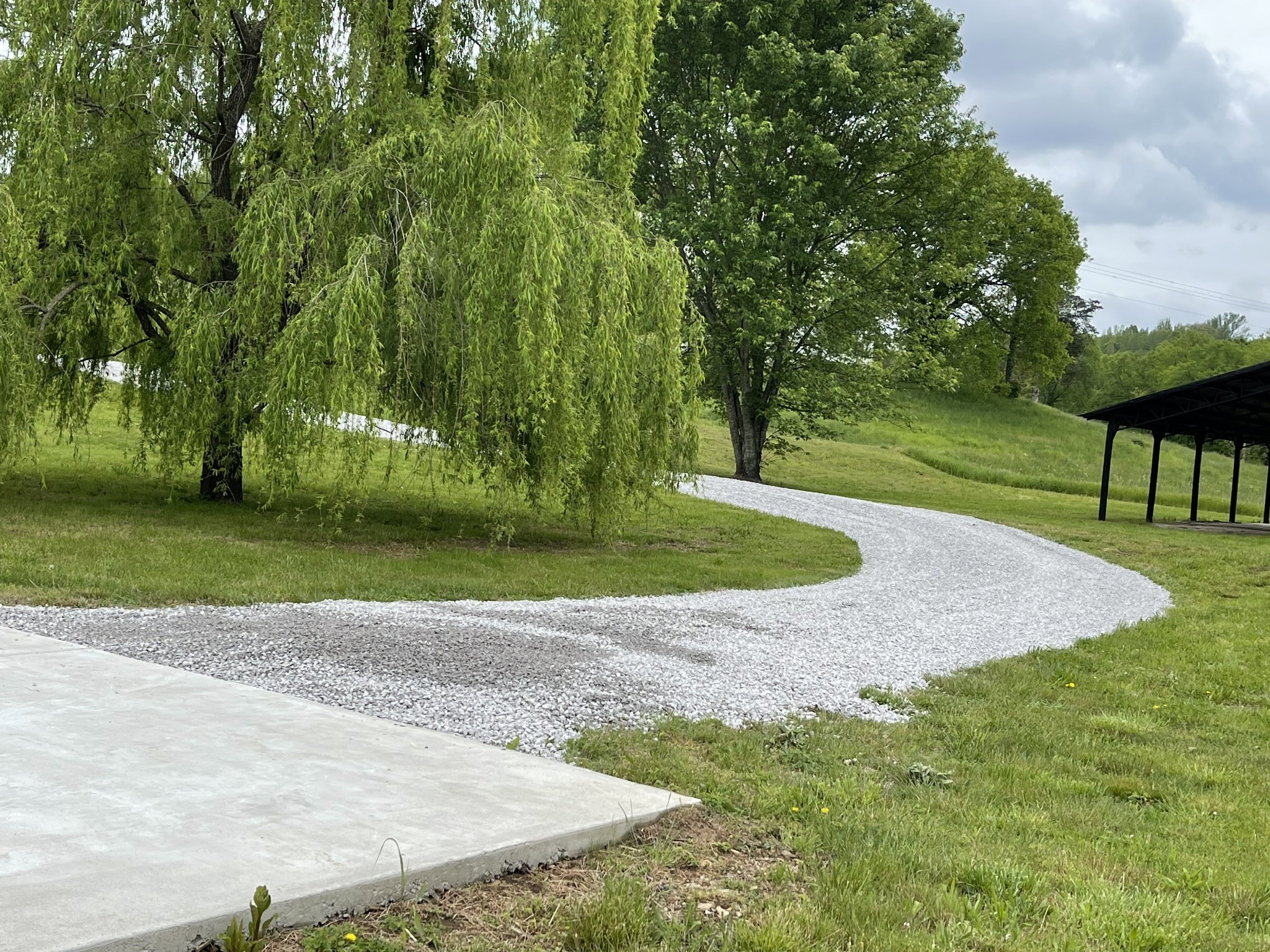 4768 Stella Road Prospect, TN 38477 - Photo 33 of 33 a view of a garden with a fountain