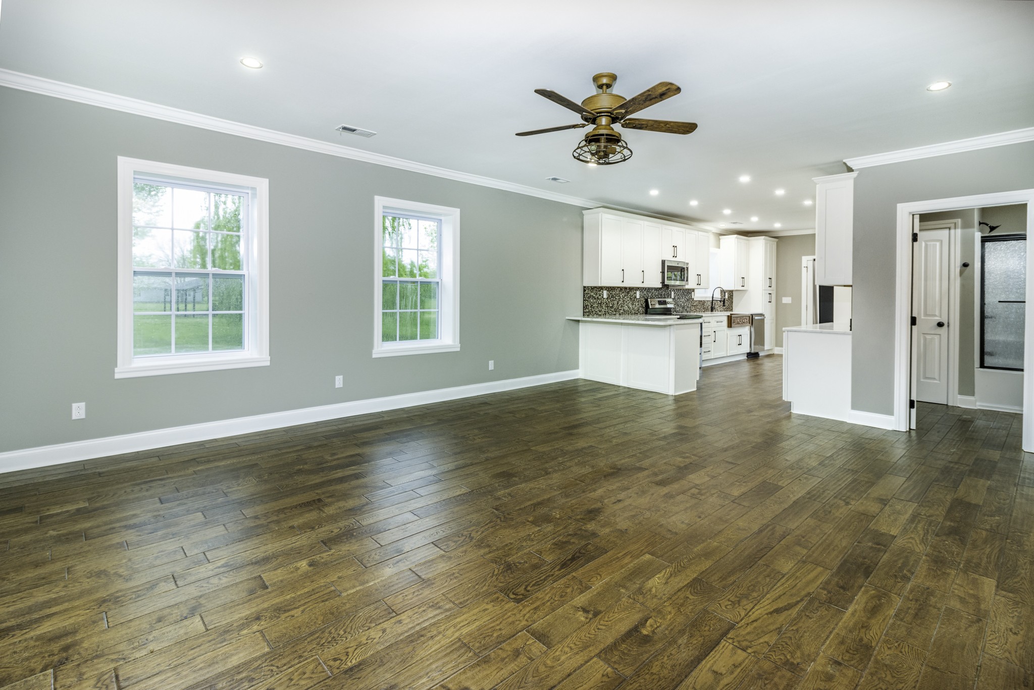 4768 Stella Road Prospect, TN 38477 - Photo 4 of 33 a view of a kitchen with wooden floor and a window