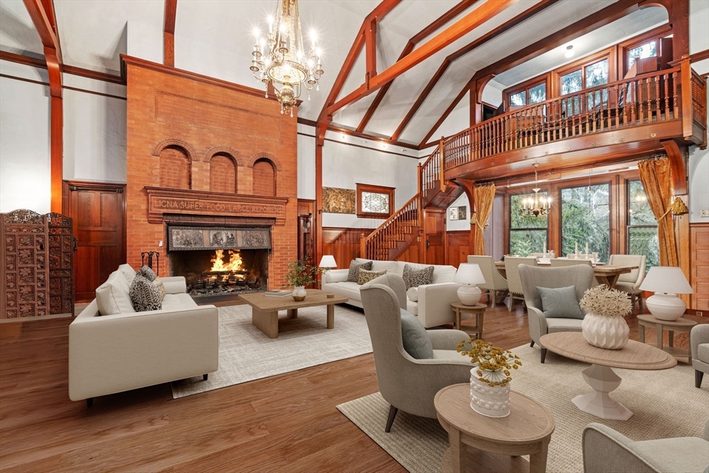 660 South Street Needham, MA 02492 - Photo 4 of 23 a living room with furniture a fireplace and a table