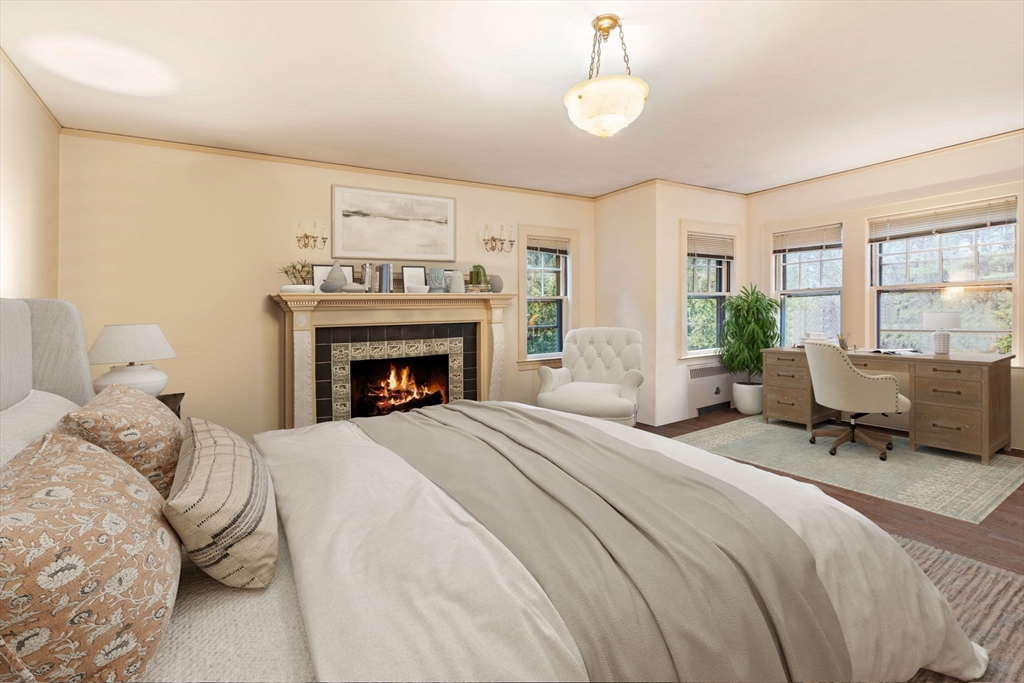 660 South Street Needham, MA 02492 - Photo 6 of 23 a bedroom with a bed and a fireplace