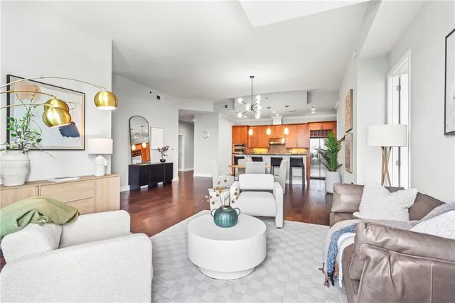 a bedroom with a large bed and a large window