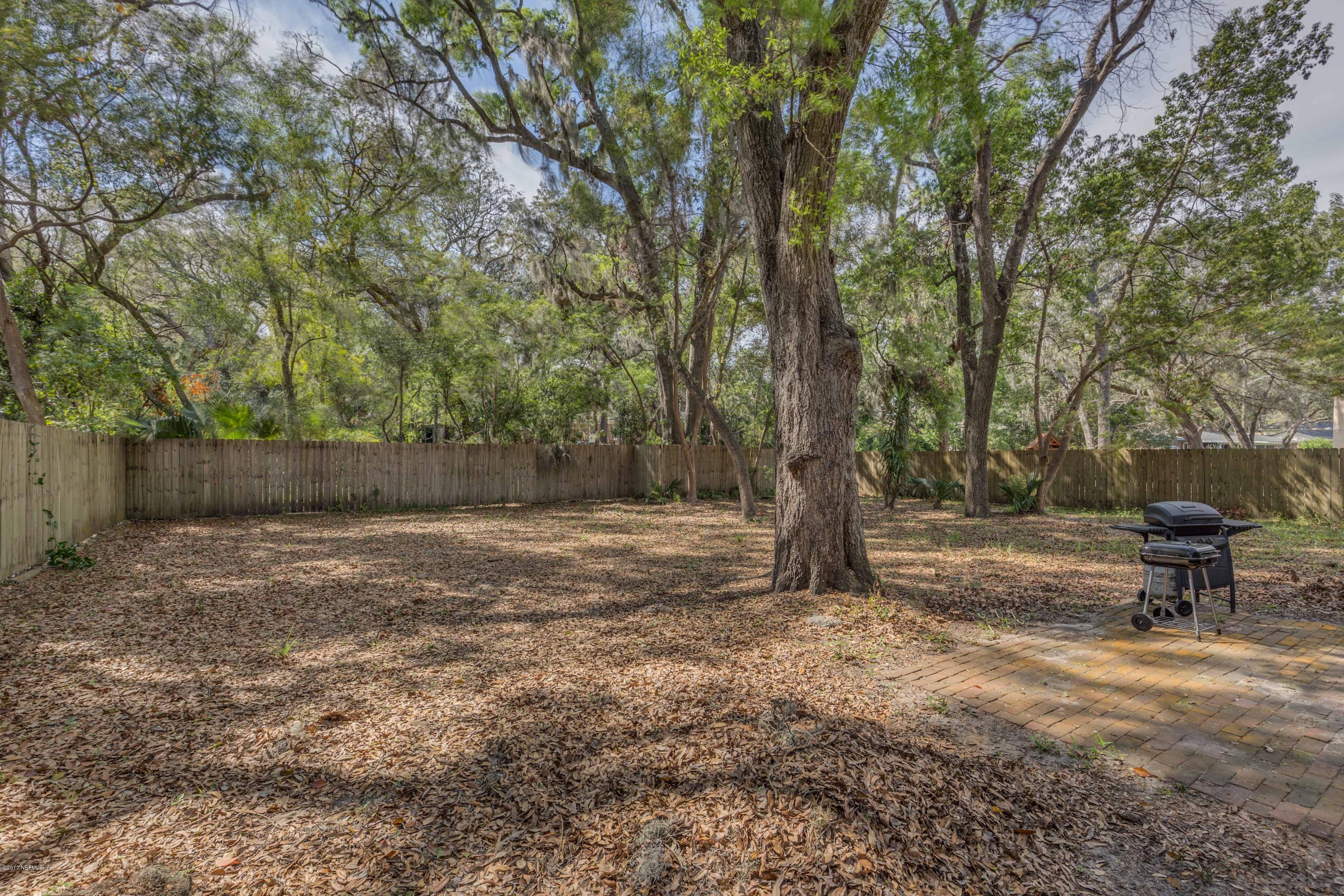 4020 Rogero Road Jacksonville, FL 32277 - Photo 19 of 23 a view of a park with a tree