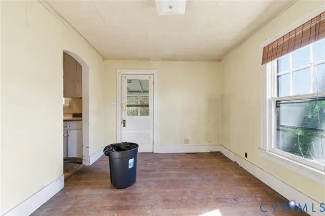 a view of a living room with a window