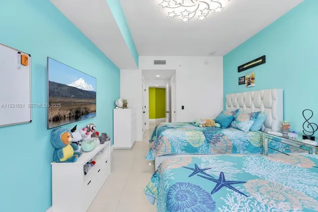 a bathroom with a toilet a sink and a mirror