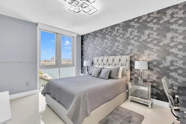 a bedroom with a bed and a table