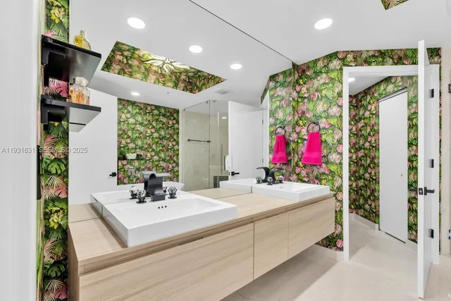 a bathroom with a toilet and a shower curtain