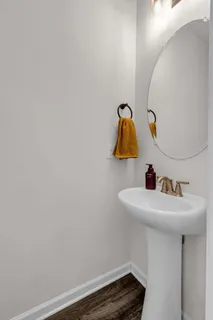 a bedroom with a bed and chair