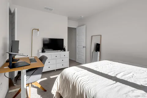 a view of cabinets with wooden floor