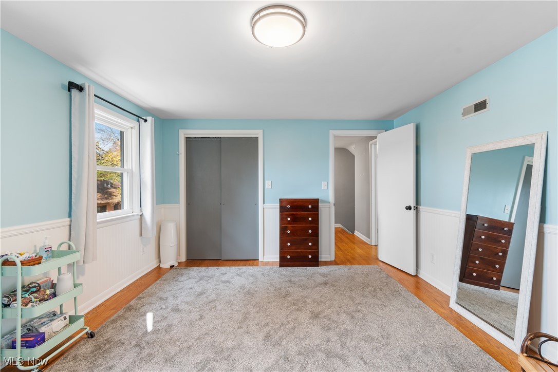 1436 Rumbaugh Circle Wooster, OH 44691 - Photo 20 of 30 Bedroom featuring light wood-type flooring and a closet