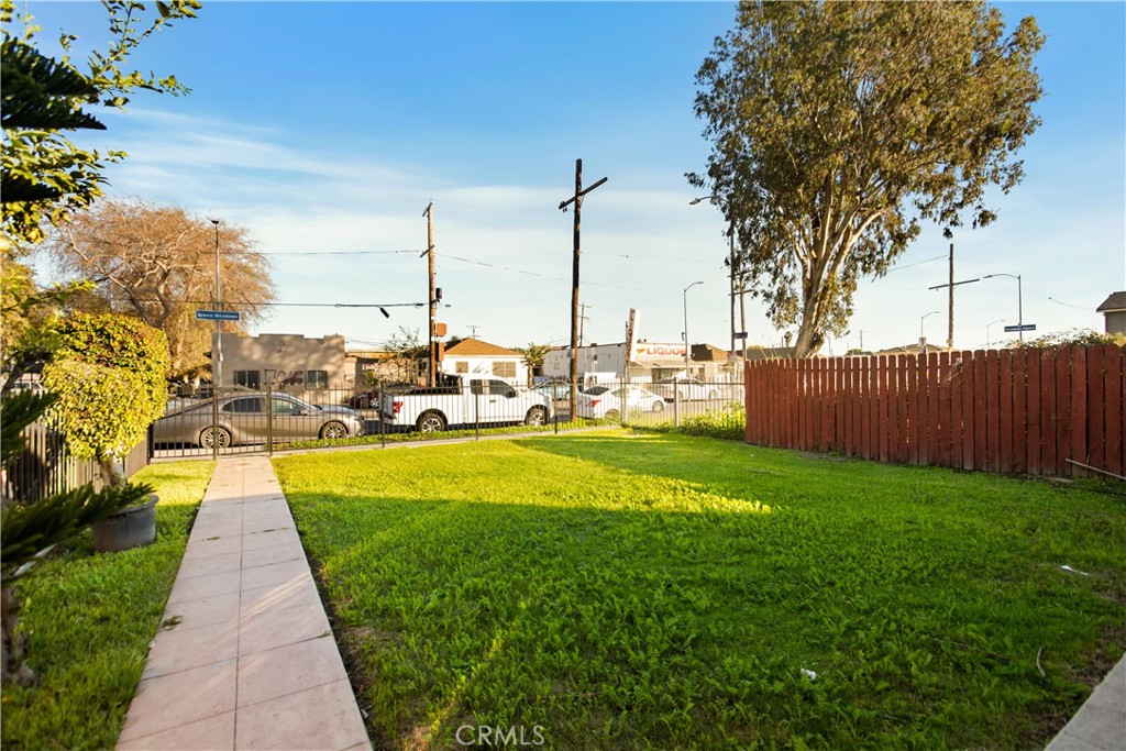 8449 Main Street Los Angeles, CA 90003 - Photo 14 of 17 a view of a garden with sitting area