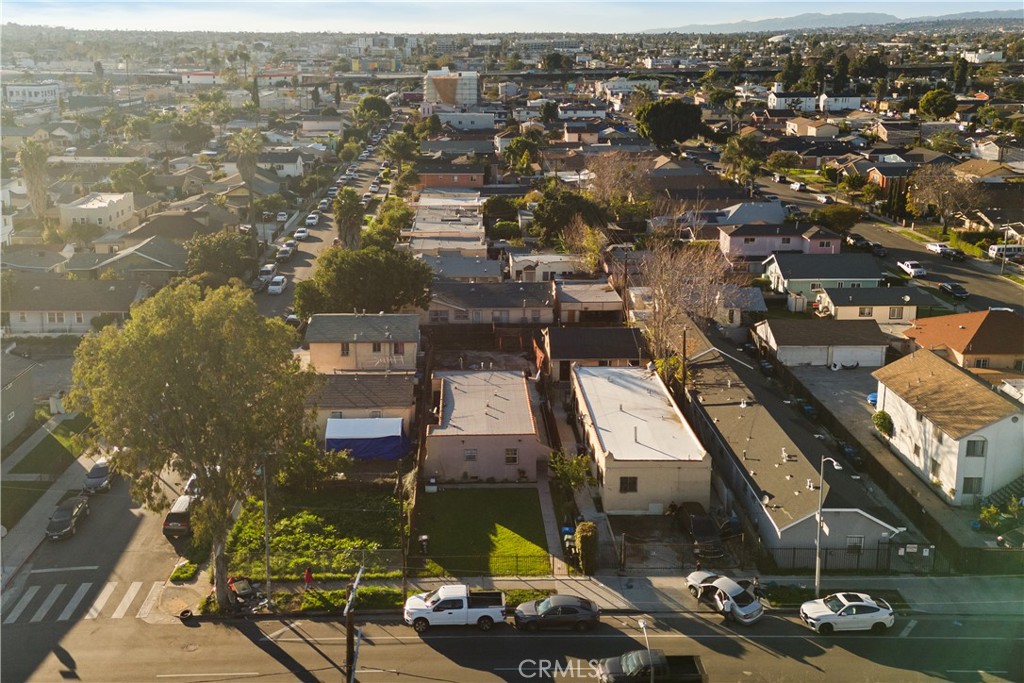 8449 Main Street Los Angeles, CA 90003 - Photo 8 of 17 an aerial view of multiple house