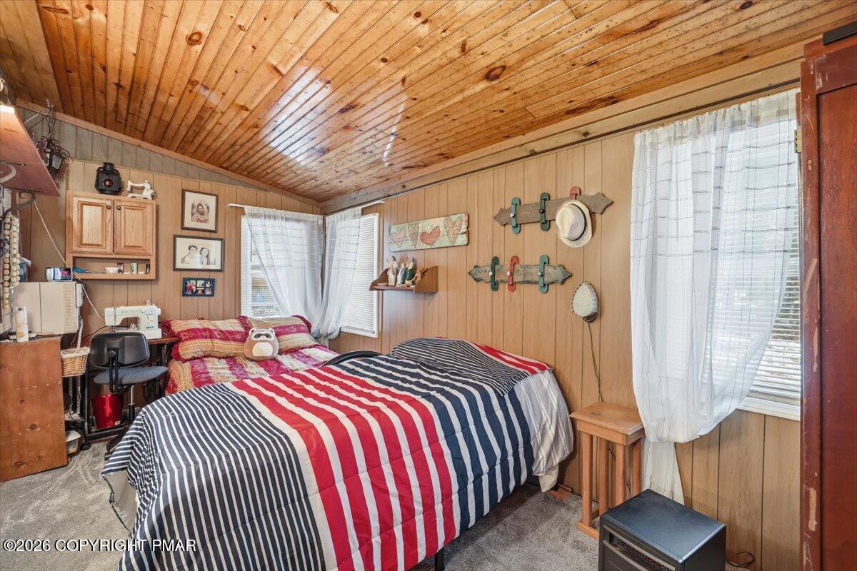 47 Red Wing Path Gouldsboro, PA 18424 - Photo 30 of 51 a bedroom with a bed and wooden floor