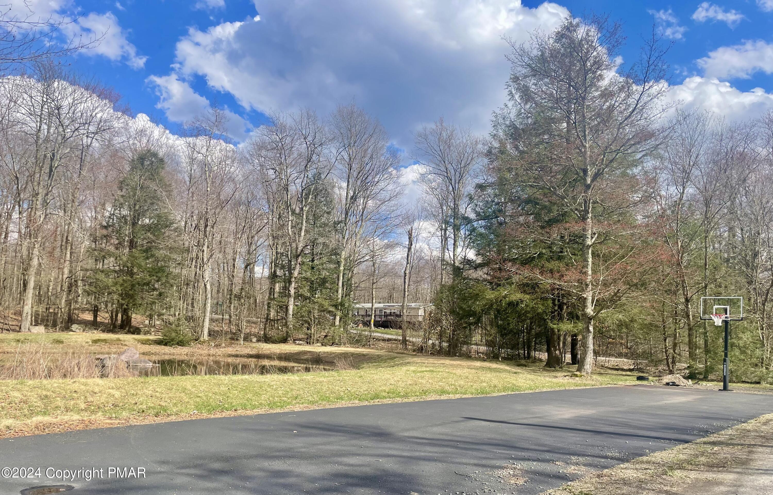 47 Red Wing Path Gouldsboro, PA 18424 - Photo 45 of 51 a view of road with trees