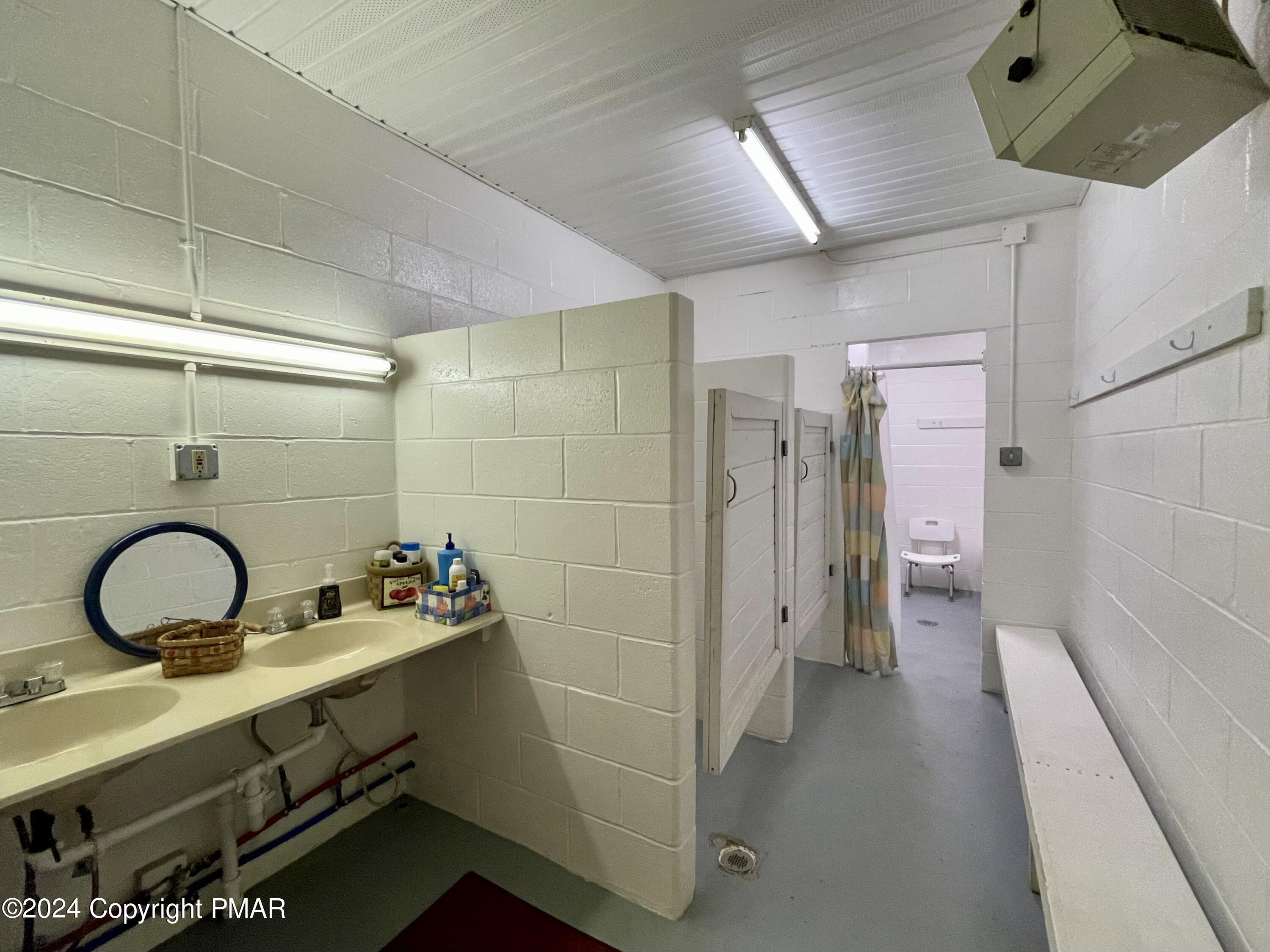 47 Red Wing Path Gouldsboro, PA 18424 - Photo 50 of 51 a bathroom with a sink a toilet and a shower