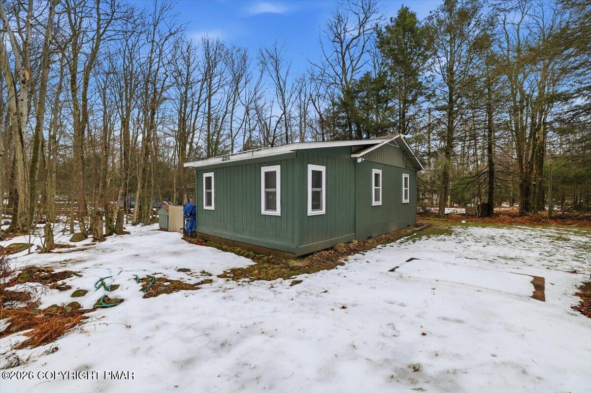 47 Red Wing Path Gouldsboro, PA 18424 - Photo 6 of 51 a view of a house with a yard covered in snow