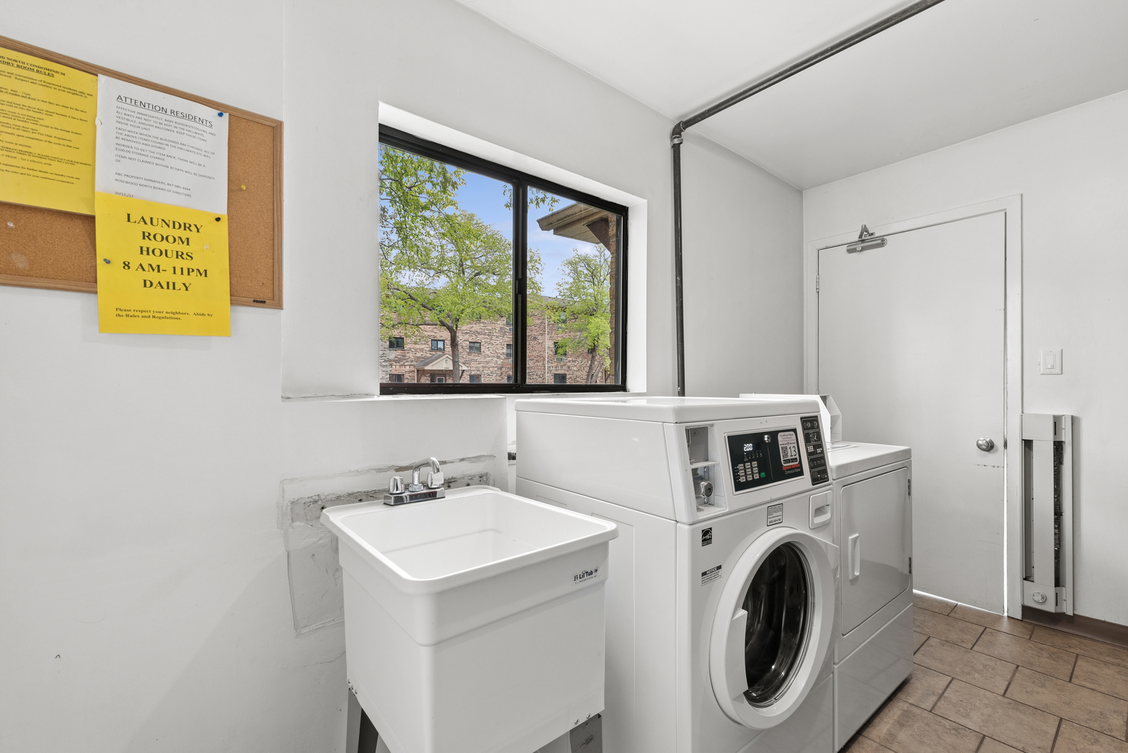 2213 West Nichols Road, Unit B Arlington Heights, IL 60004 - Photo 16 of 23 a utility room with dryer and washer