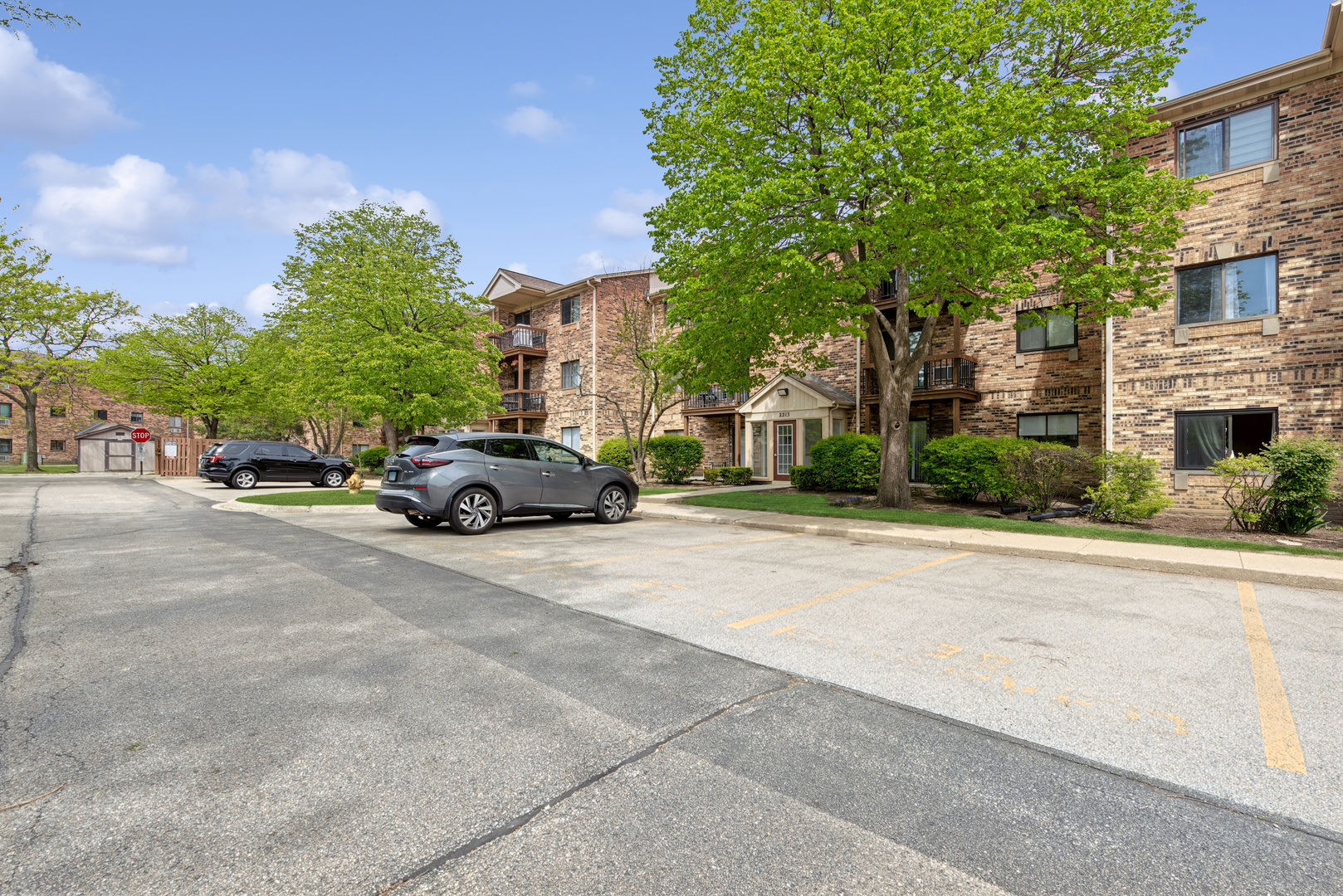 2213 West Nichols Road, Unit B Arlington Heights, IL 60004 - Photo 19 of 23 a car parked on the side of a street
