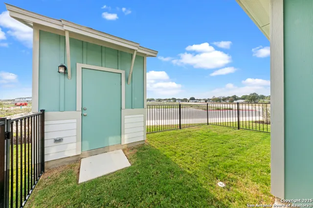 a view of a backyard with garden
