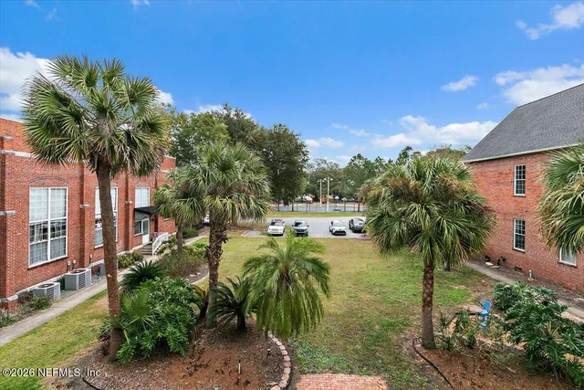 a view of swimming pool with a garden