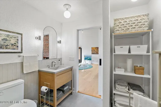 a bathroom with a shower and toilet