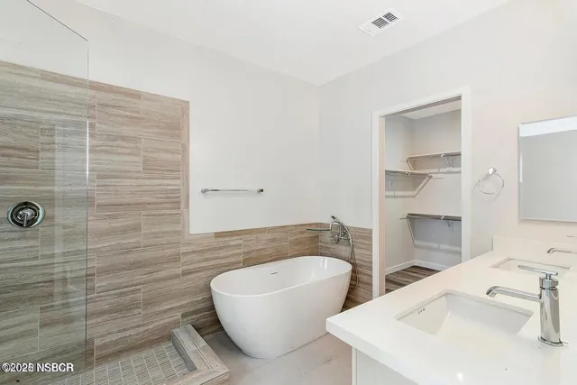 a bathroom with a sink and a bathtub