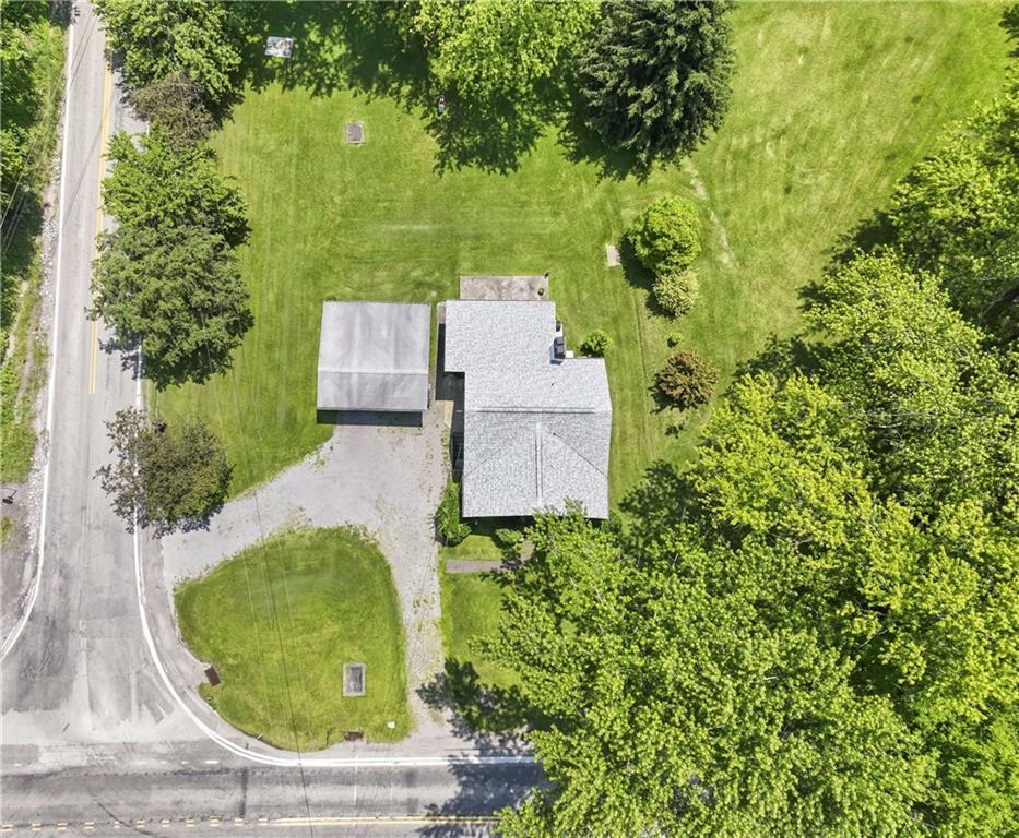 890 Deer Lane Rochester, PA 15074 - Photo 18 of 22 an aerial view of a house with a garden and trees