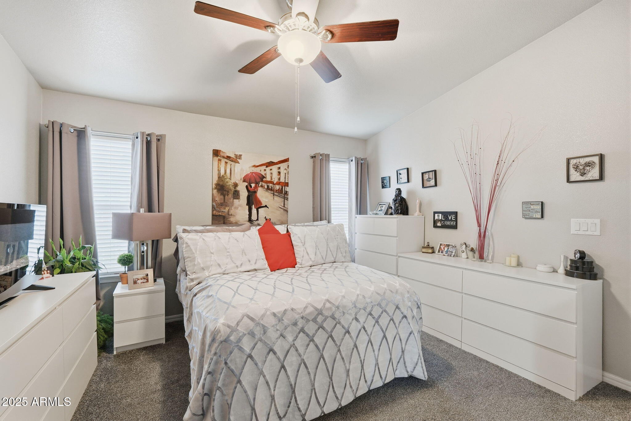 8865 East Baseline Road, Unit 130 Mesa, AZ 85209 - Photo 14 of 48 a bed room with a bed and a couch