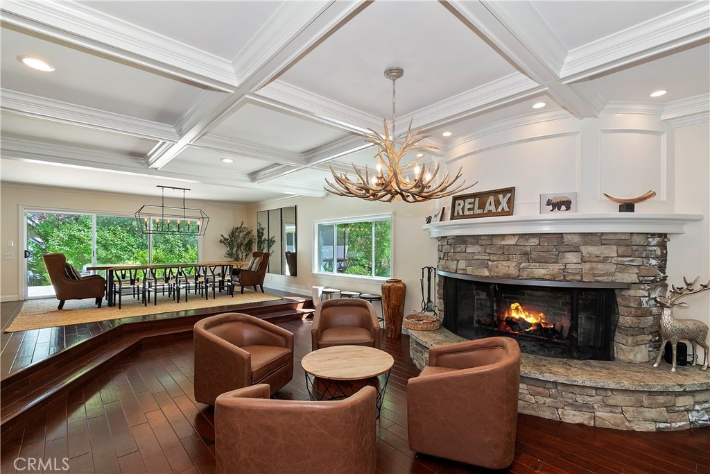 28411 North Shore Road Lake Arrowhead, CA 92352 - Photo 11 of 66 a living room with furniture fireplace and a large window