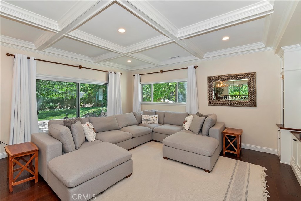 28411 North Shore Road Lake Arrowhead, CA 92352 - Photo 12 of 66 a living room with furniture and a large window