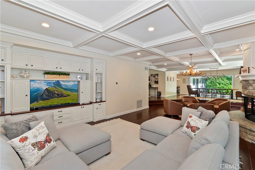 28411 North Shore Road Lake Arrowhead, CA 92352 - Photo 13 of 66 a living room with furniture and a flat screen tv