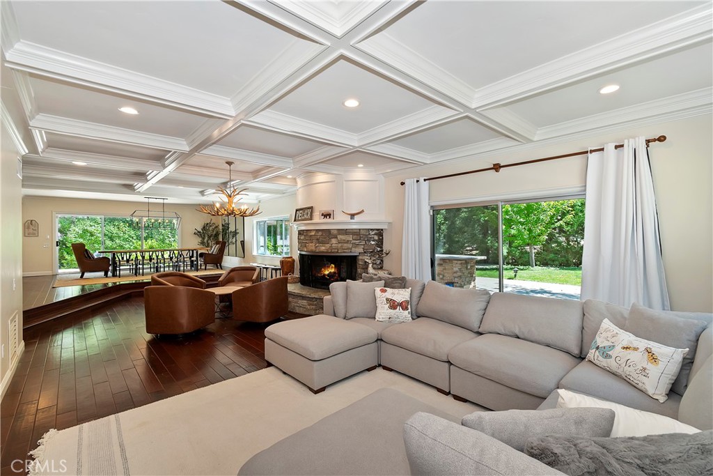 28411 North Shore Road Lake Arrowhead, CA 92352 - Photo 14 of 66 a living room with furniture fireplace and a large window