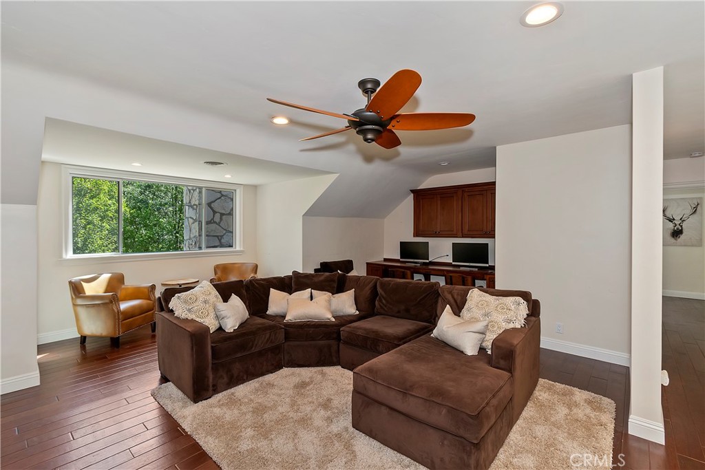28411 North Shore Road Lake Arrowhead, CA 92352 - Photo 31 of 66 a living room with furniture and a window