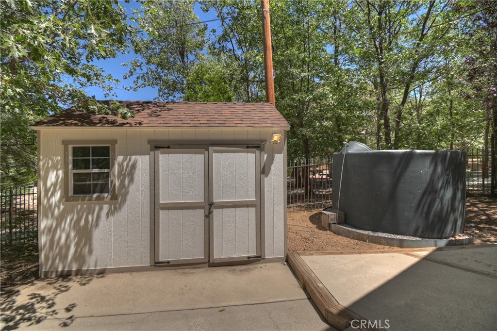 28411 North Shore Road Lake Arrowhead, CA 92352 - Photo 63 of 66 a view of backyard with cabin