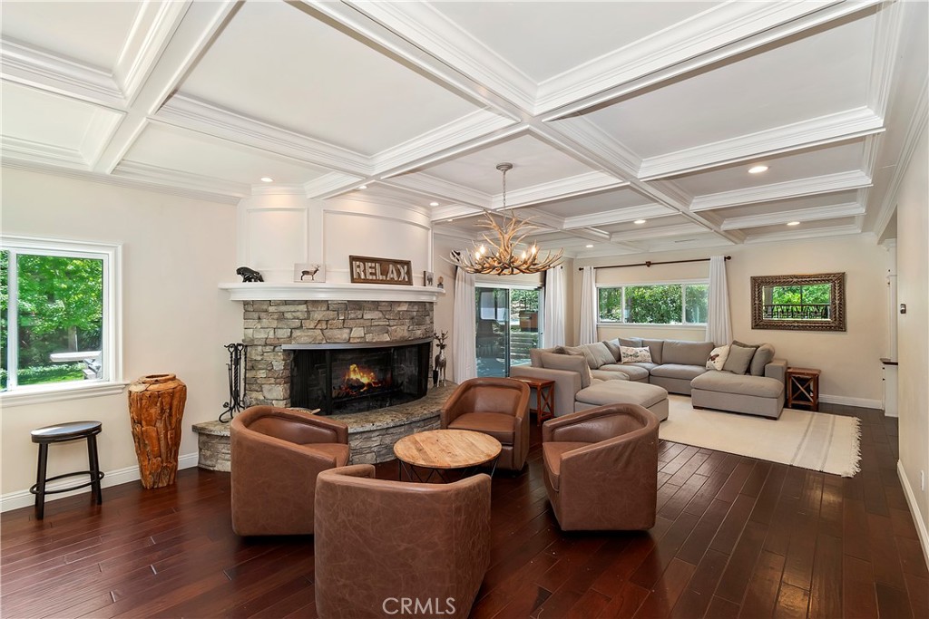 28411 North Shore Road Lake Arrowhead, CA 92352 - Photo 7 of 66 a living room with furniture and a fireplace