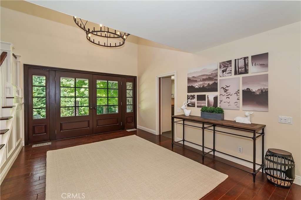 28411 North Shore Road Lake Arrowhead, CA 92352 - Photo 8 of 66 a bedroom with a large bed and a window