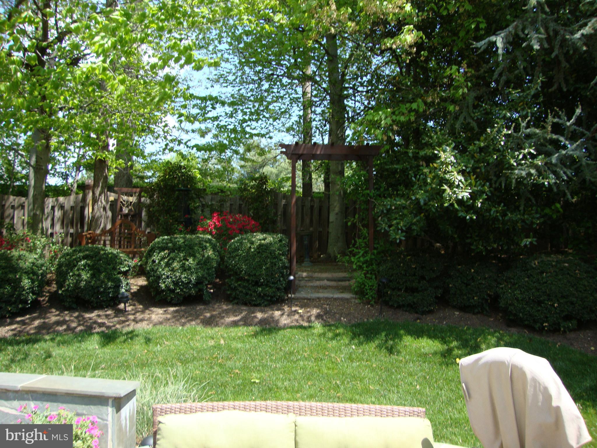 9302 Mac Swain Place Springfield, VA 22153 - Photo 62 of 69 Back Yard Rear trees and stone pathway
