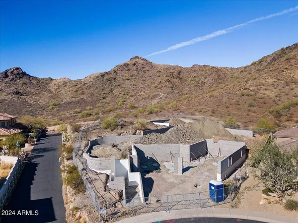 a view of a deck with table and chairs with wooden floor
