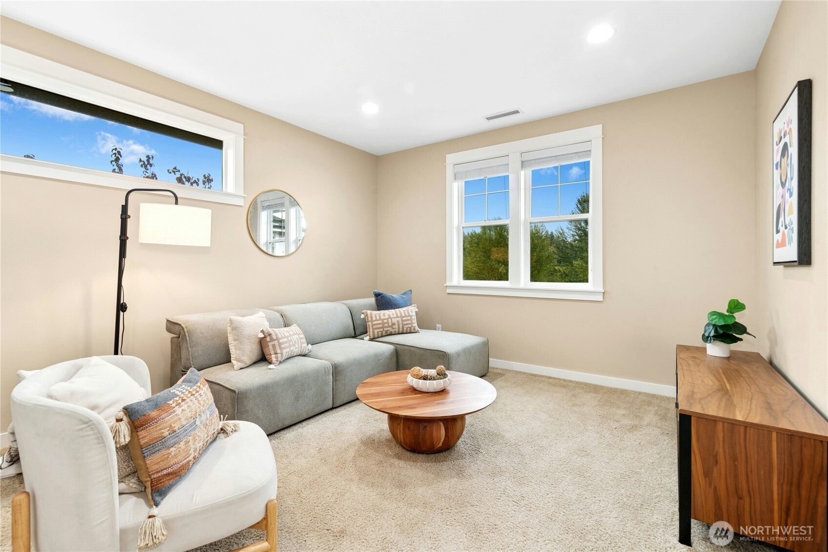14713 98th Avenue Northeast Bothell, WA 98011 - Photo 22 of 40 a living room with furniture and a window