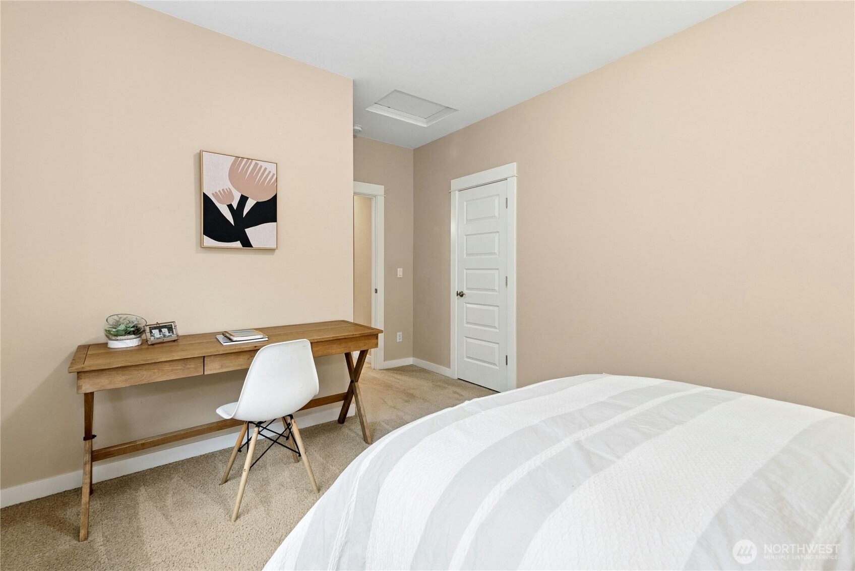 14713 98th Avenue Northeast Bothell, WA 98011 - Photo 28 of 40 a bedroom with a chair and a desk