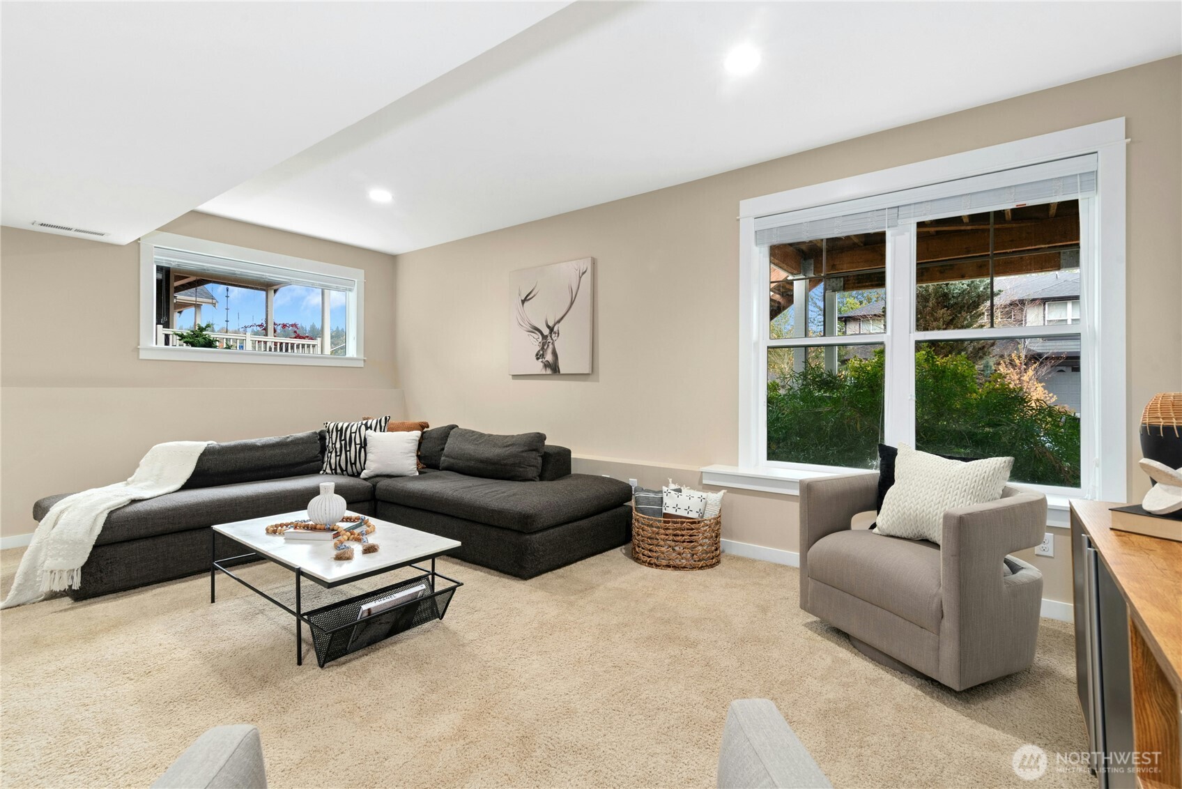 14713 98th Avenue Northeast Bothell, WA 98011 - Photo 29 of 40 a living room with furniture and a large window