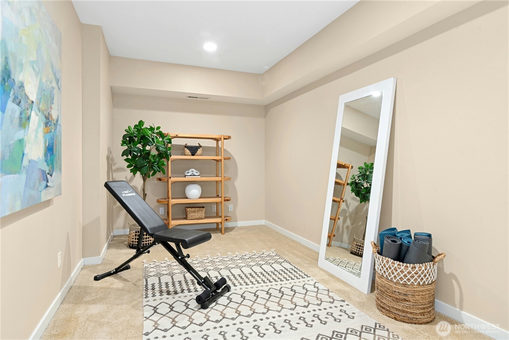 14713 98th Avenue Northeast Bothell, WA 98011 - Photo 31 of 40 a living room with a couch and potted plant