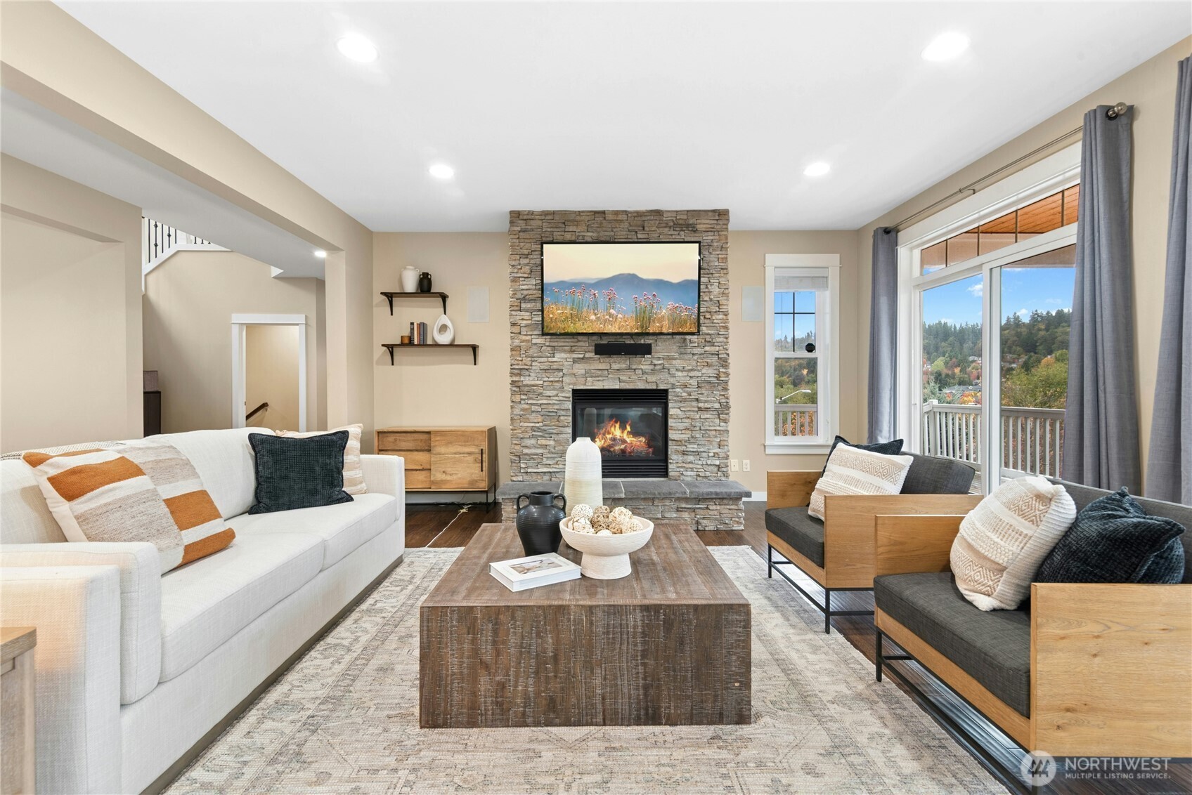 14713 98th Avenue Northeast Bothell, WA 98011 - Photo 4 of 40 a living room with furniture fireplace and a large window